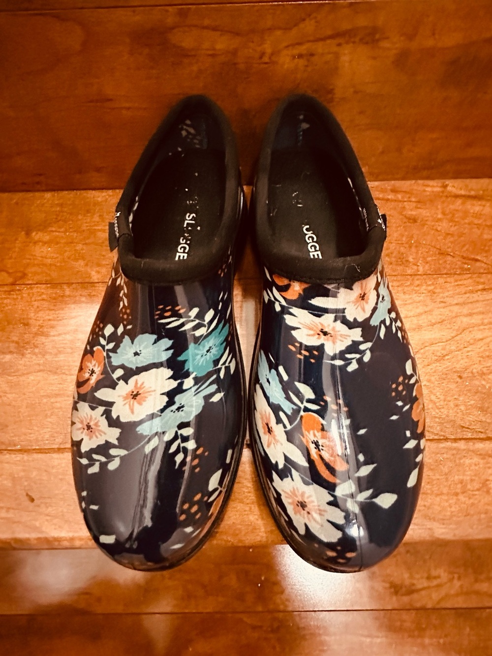 Sloggers women's waterproof garden clogs in a navy blue floral print
